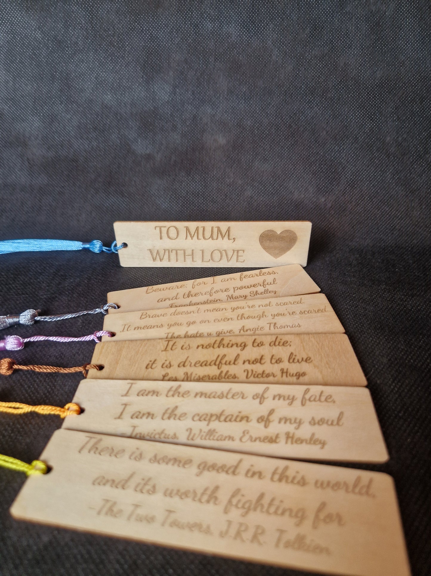 Handcrafted wooden bookmark with personalized laser engraved name and decorative design