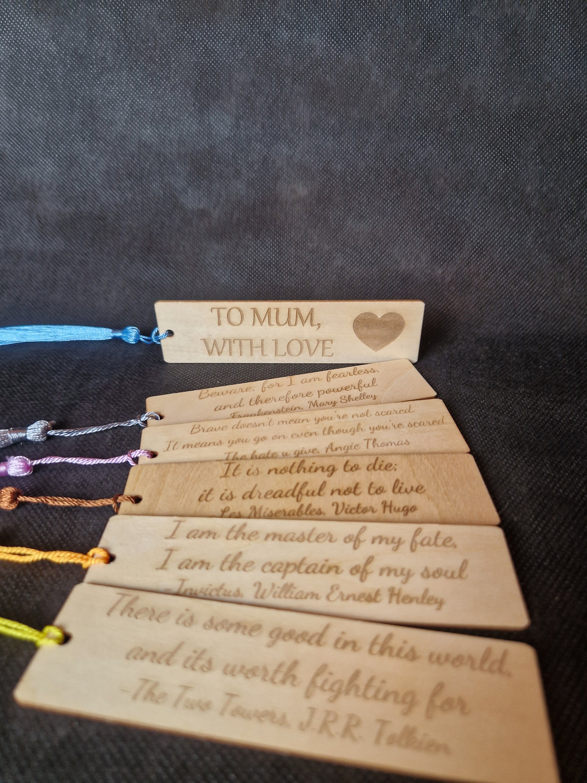 Handcrafted wooden bookmark with personalized laser engraved name and decorative design