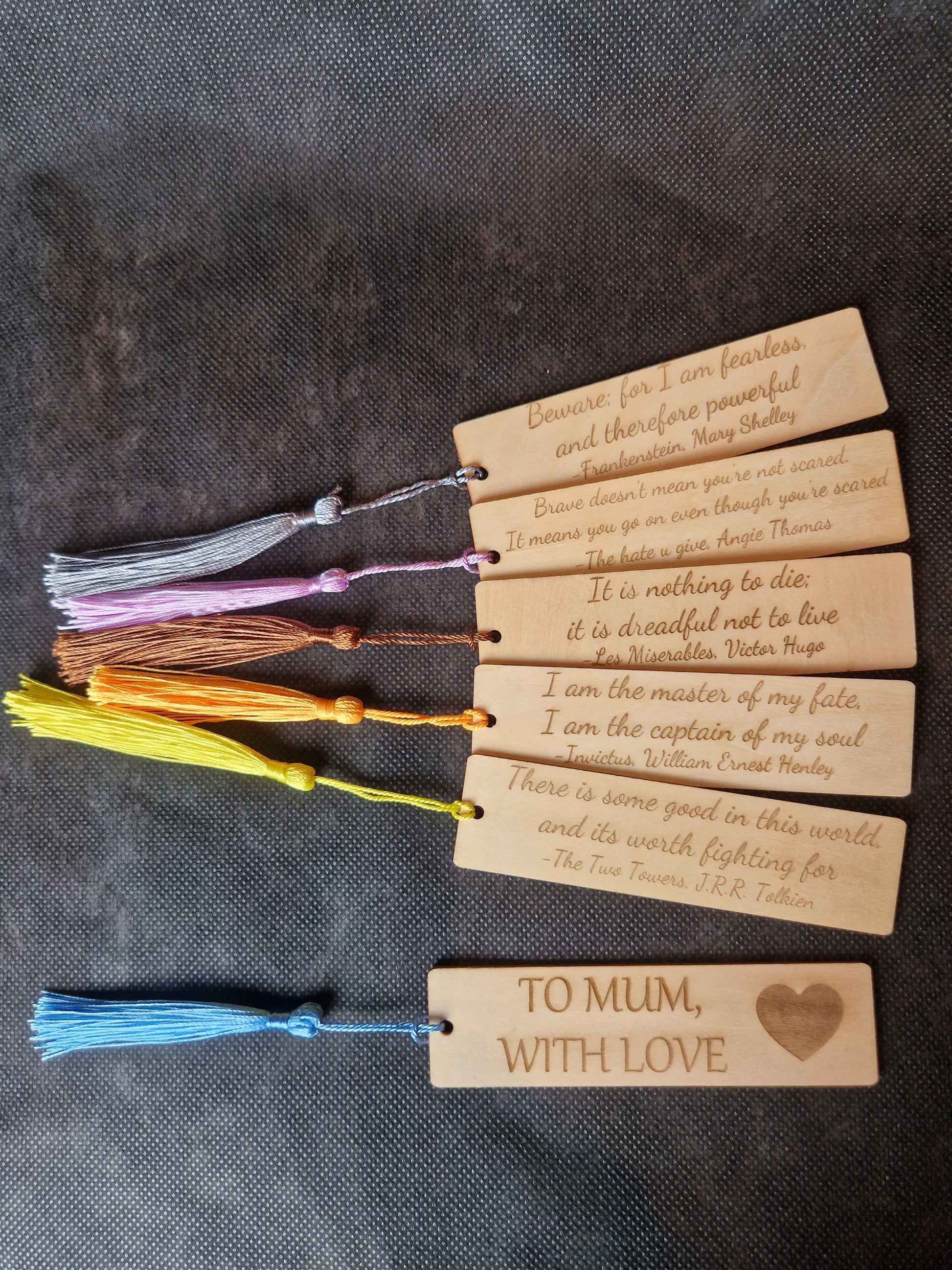 Handcrafted wooden bookmark with personalized laser engraved name and decorative design