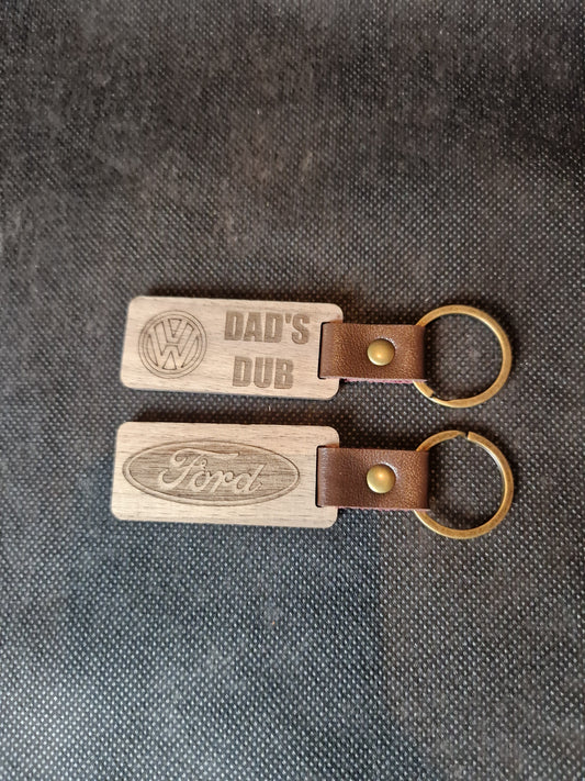 Personalized wooden keyring with laser engraved design and durable metal ring attachment