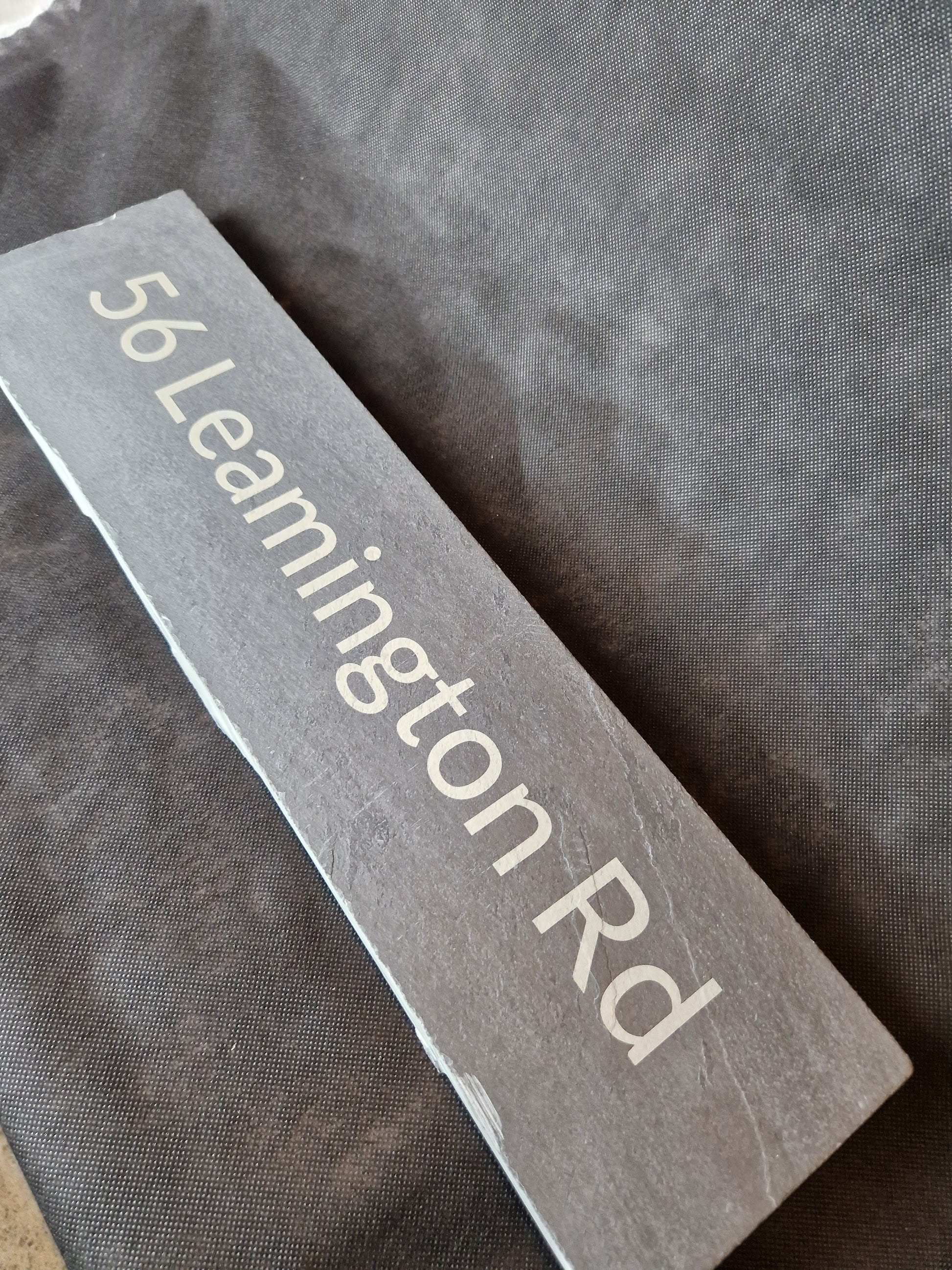 Large engraved slate sign with custom text
