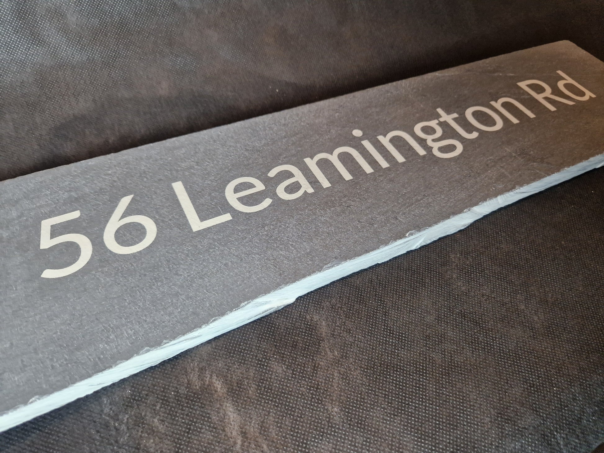 Large engraved slate sign with custom text