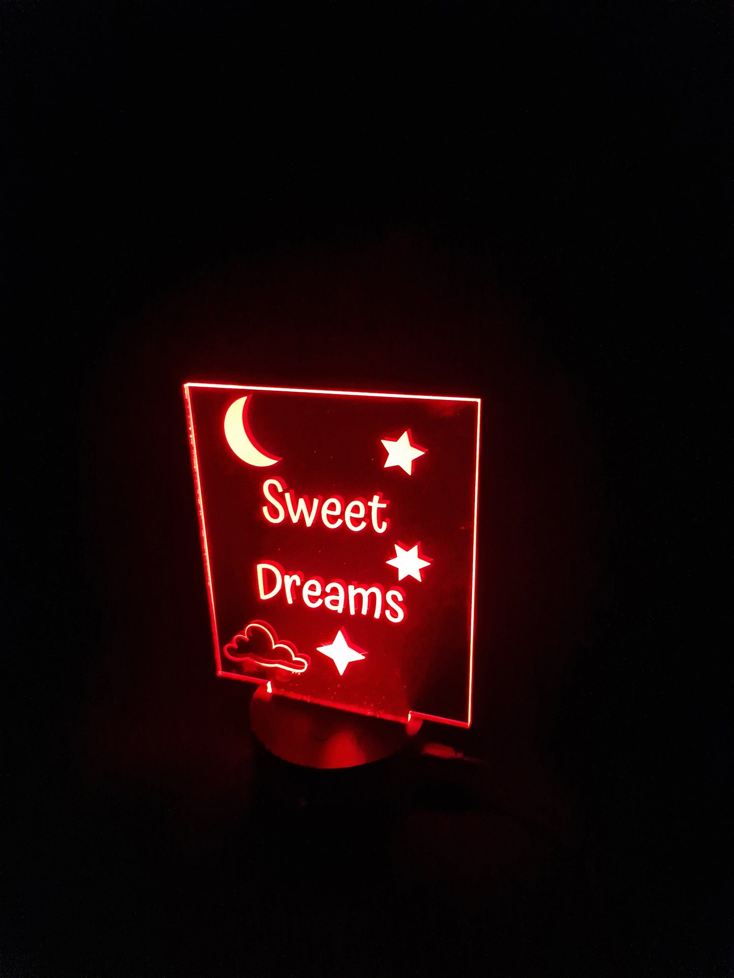 LED illuminated acrylic sign with custom laser engraved text and color-changing base