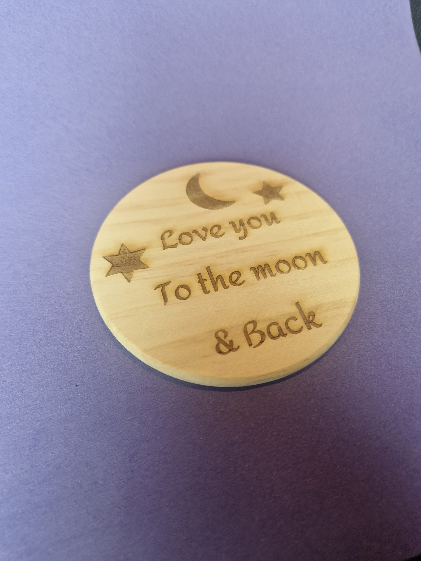 Premium wooden drink coaster with detailed laser engraved personalized design