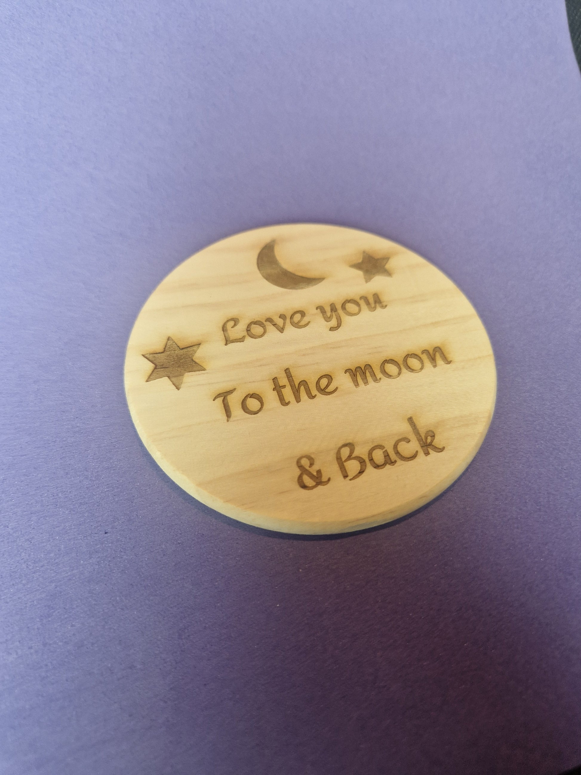 Premium wooden drink coaster with detailed laser engraved personalized design