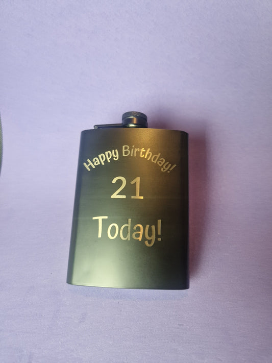 Stainless steel hip flask with personalized laser engraved message and brushed metal finish