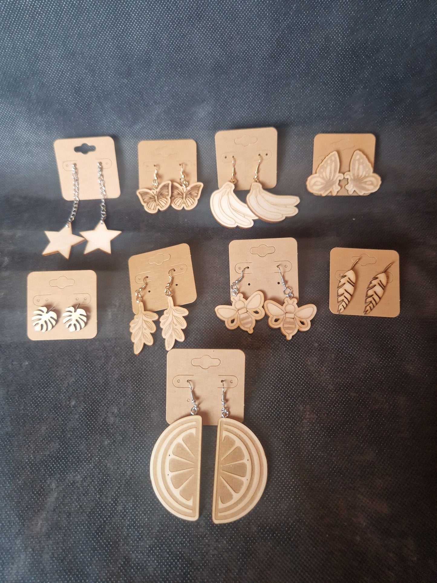 Lightweight wooden earrings with delicate laser cut design