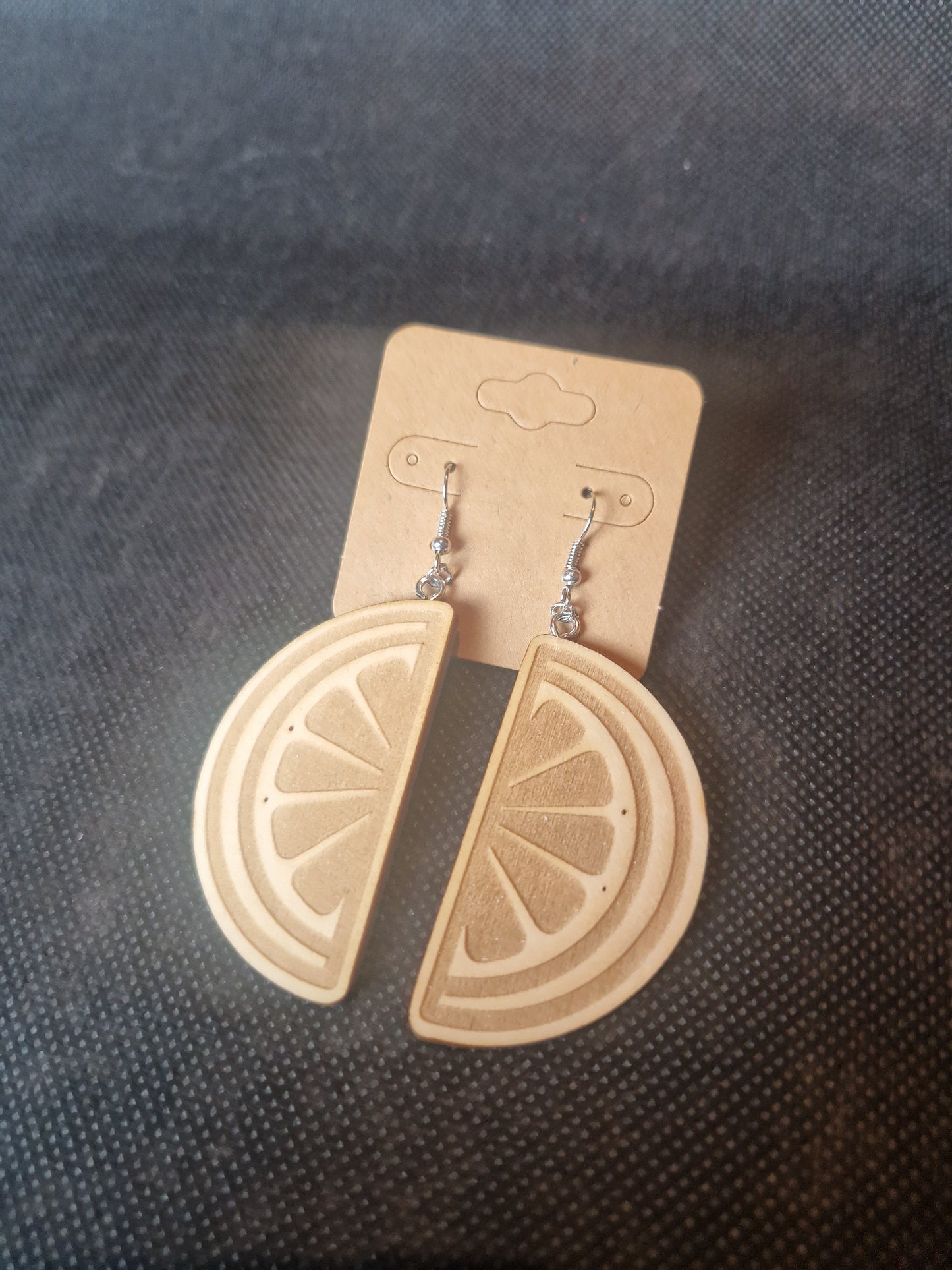 Lightweight wooden earrings with delicate laser cut design