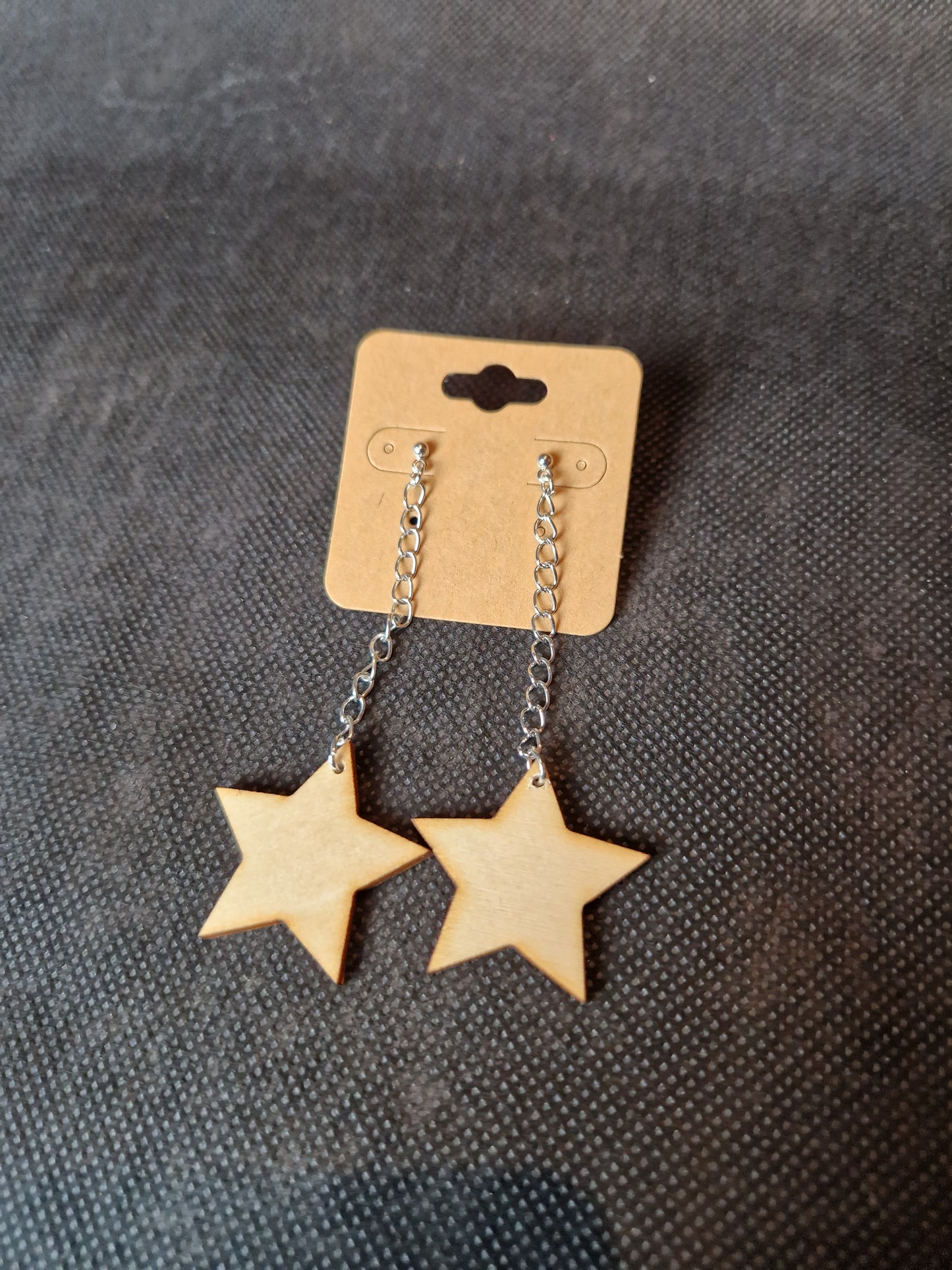 Lightweight wooden earrings with delicate laser cut design