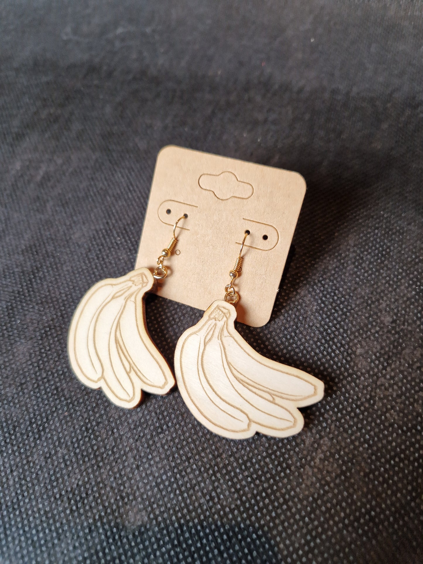 Lightweight wooden earrings with delicate laser cut design
