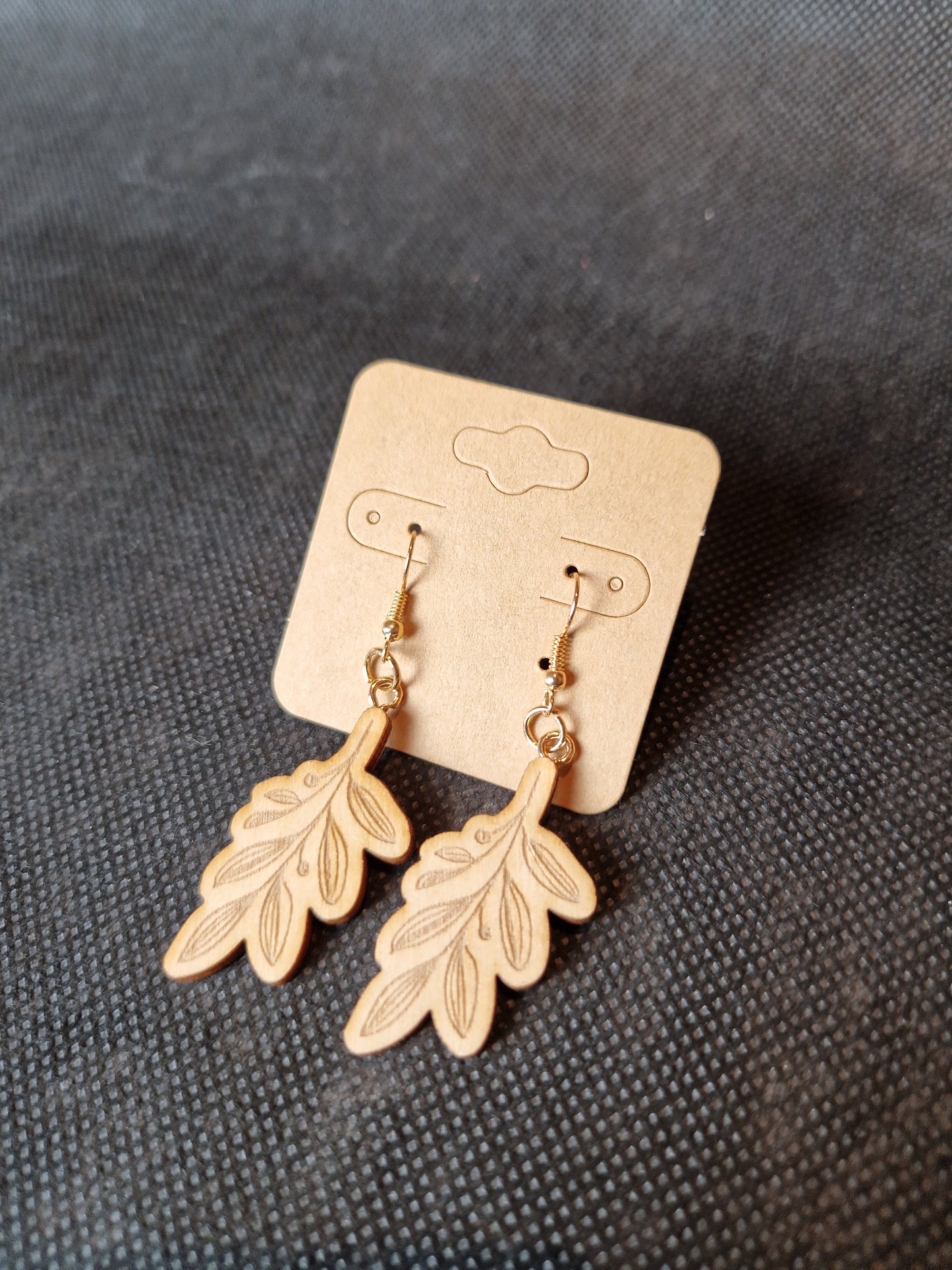 Lightweight wooden earrings with delicate laser cut design