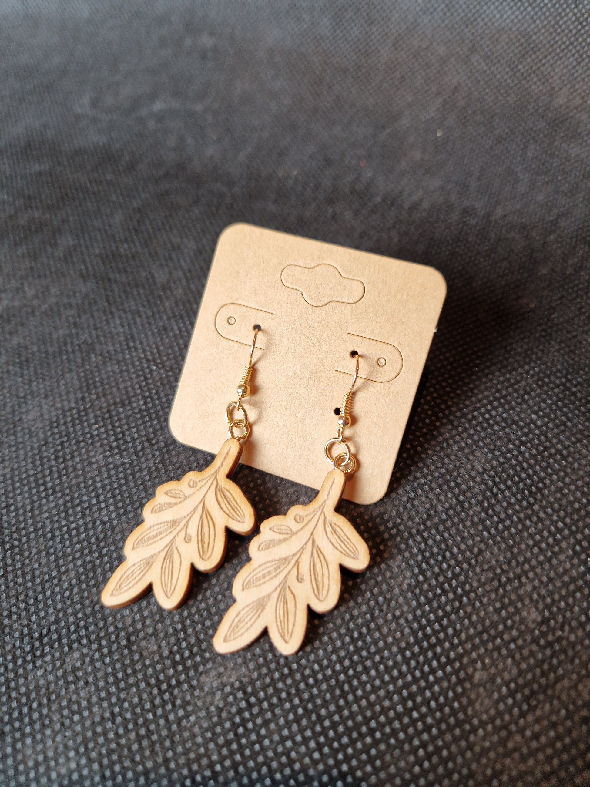 Lightweight wooden earrings with delicate laser cut design