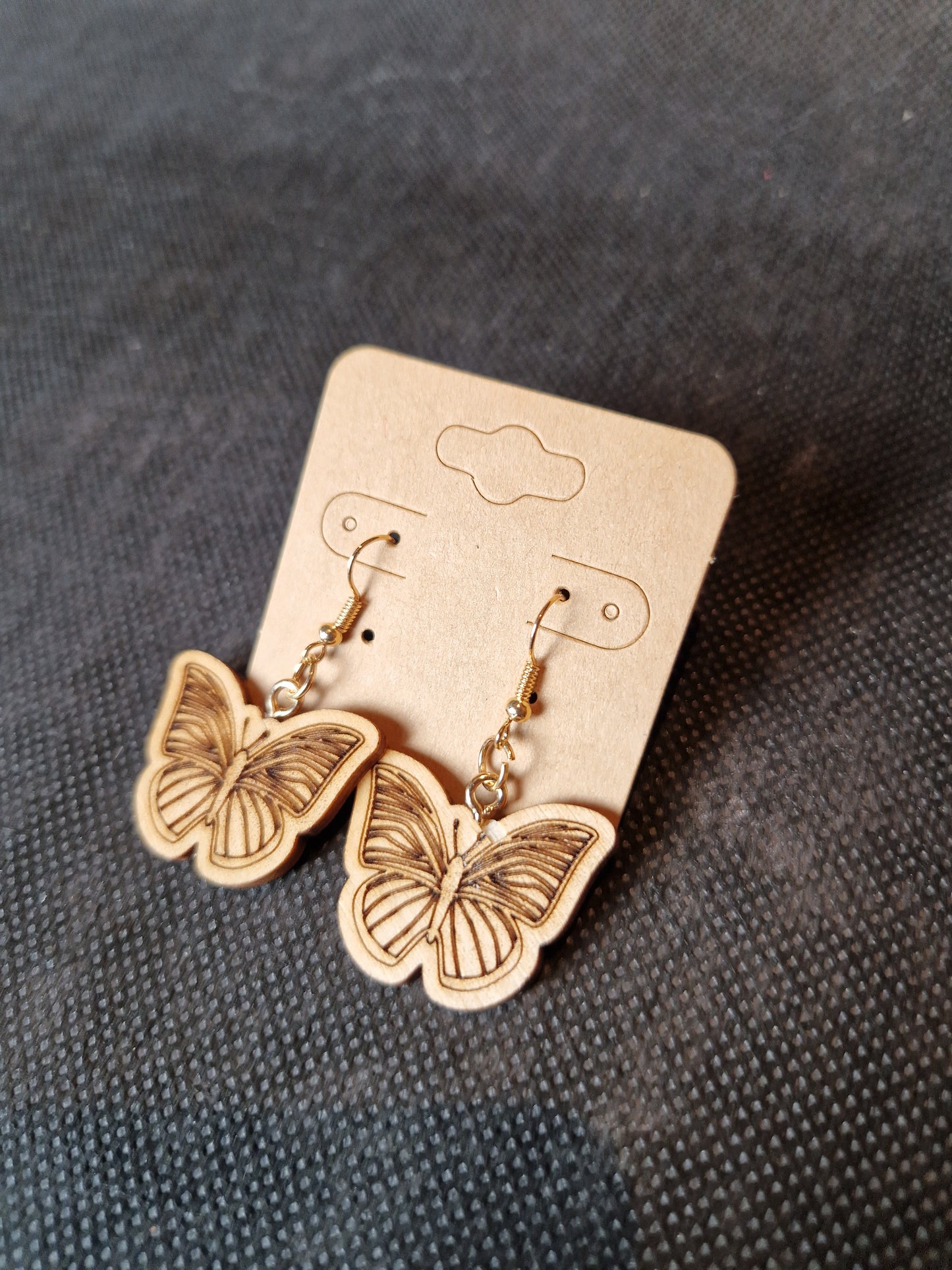 Lightweight wooden earrings with delicate laser cut design