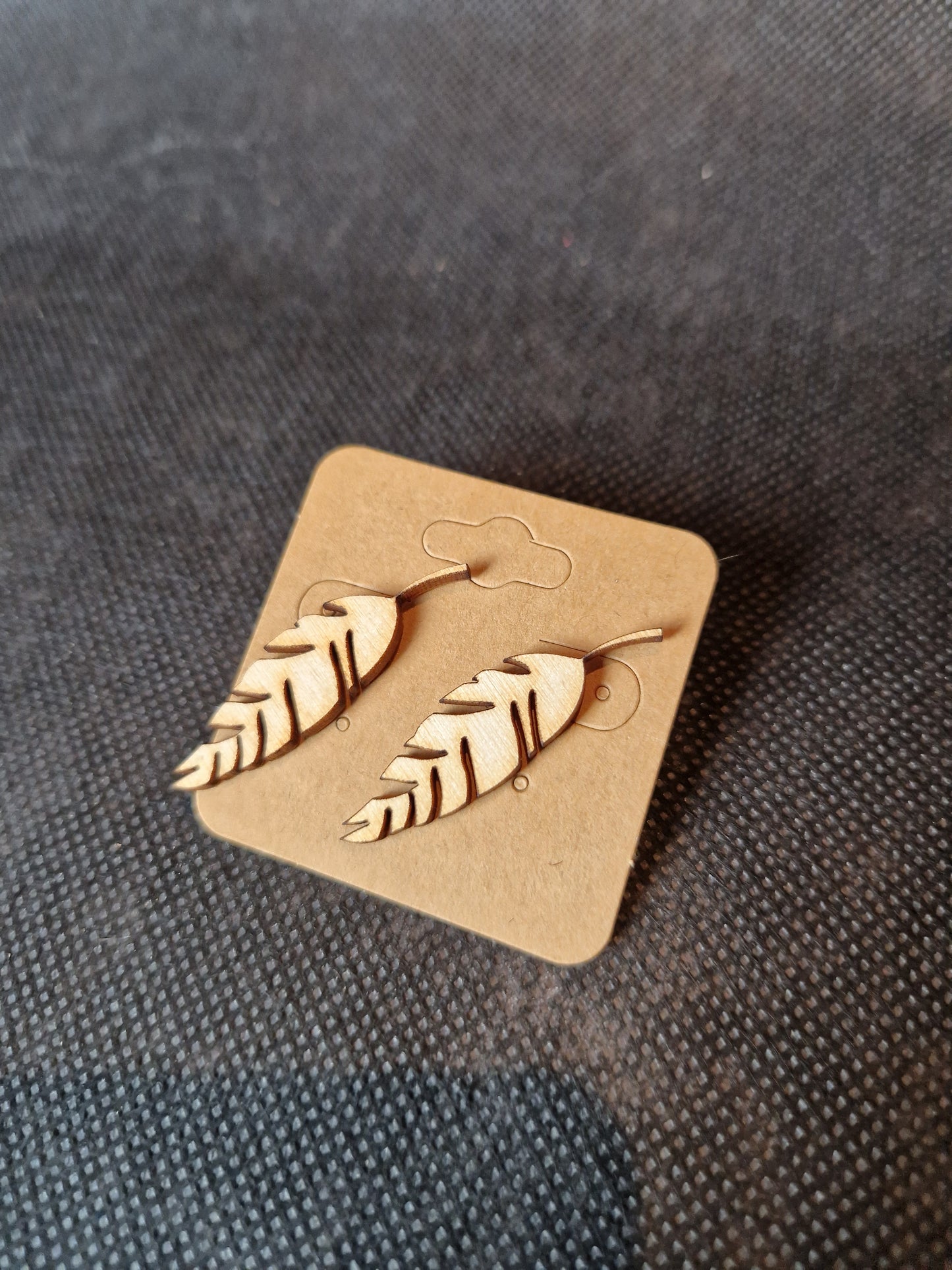 Lightweight wooden earrings with delicate laser cut design