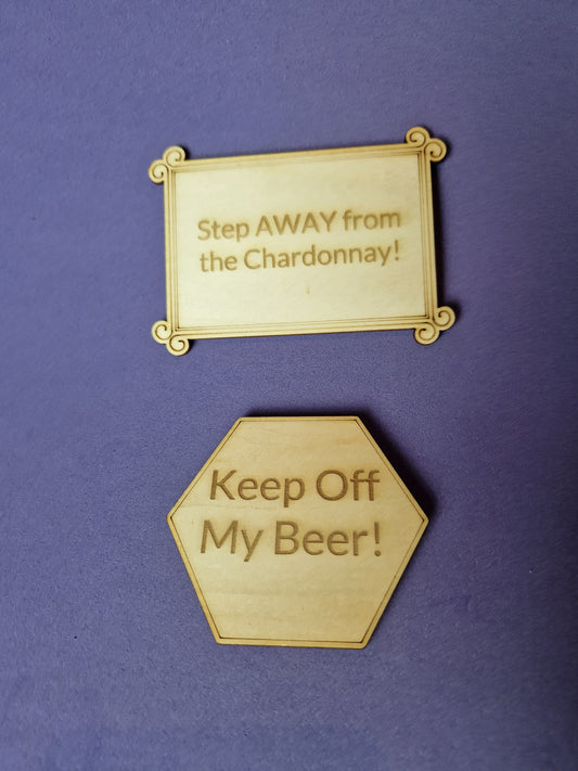 Custom wooden fridge magnet with laser engraved design and magnetic backing