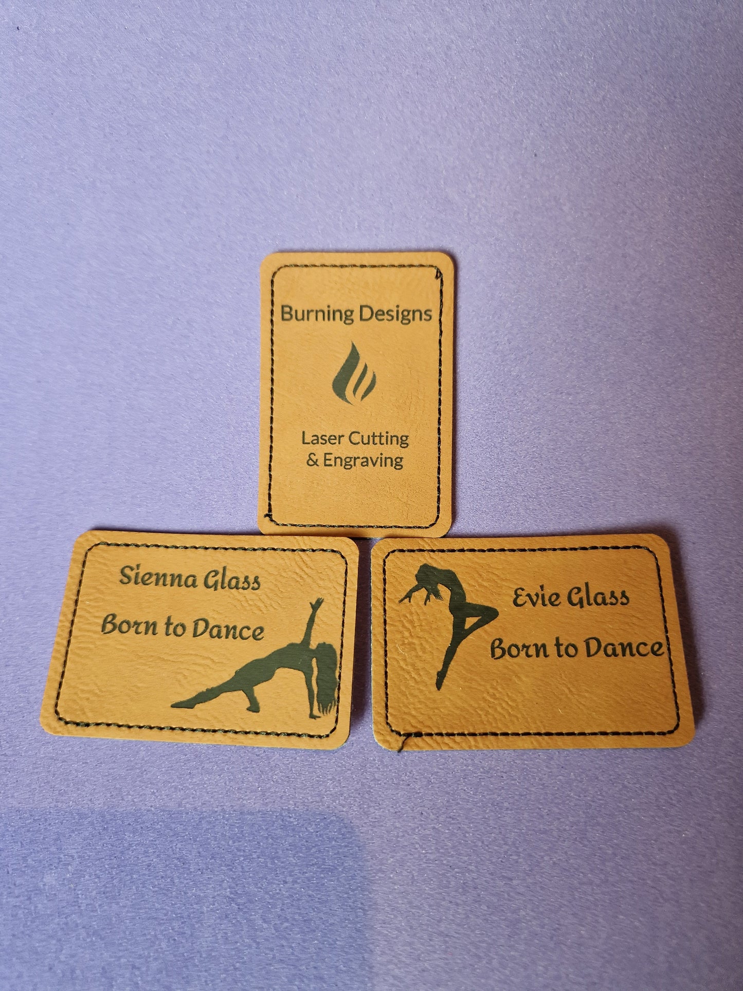 Custom faux leather patches with laser engraved design and adhesive backing
