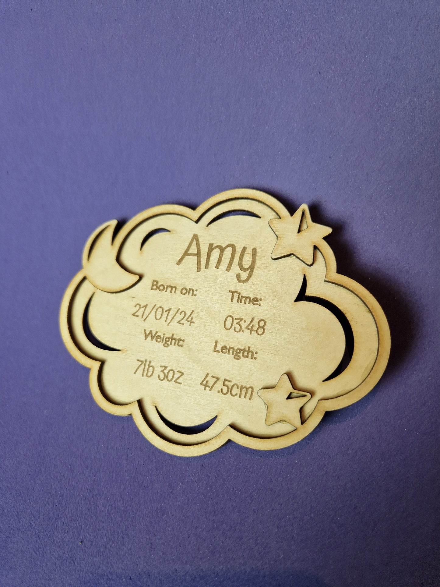 Personalized wooden baby keepsake plaque with custom birth details and decorative design