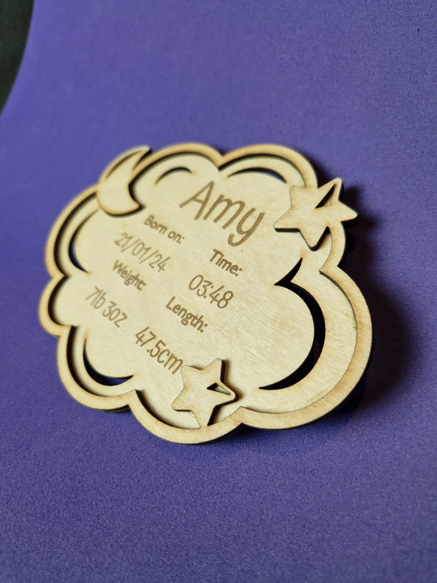 Personalized wooden baby keepsake plaque with custom birth details and decorative design