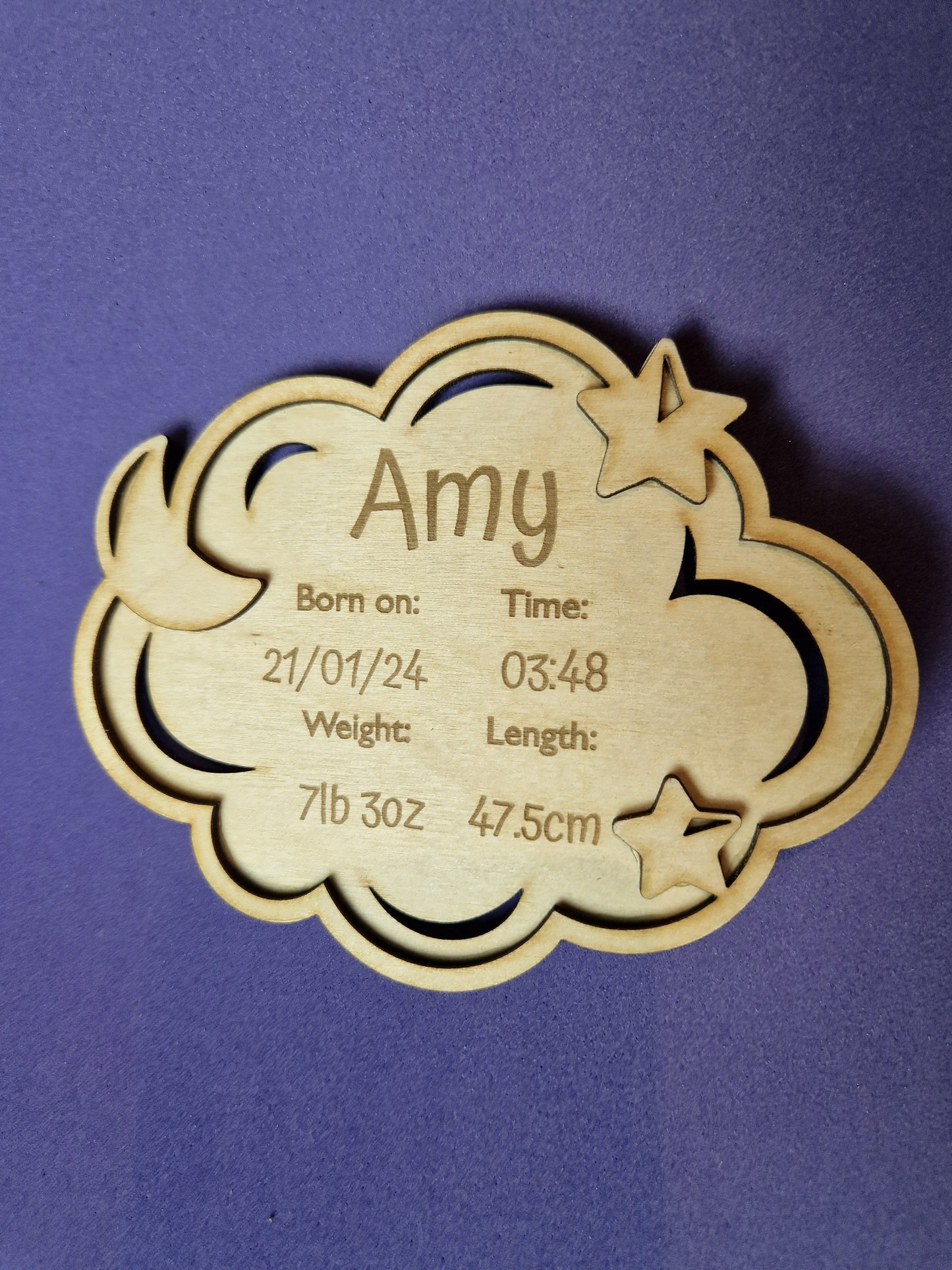 Personalized wooden baby keepsake plaque with custom birth details and decorative design