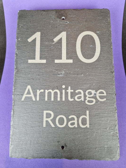Black slate A4 house sign with custom laser engraved family name and house number