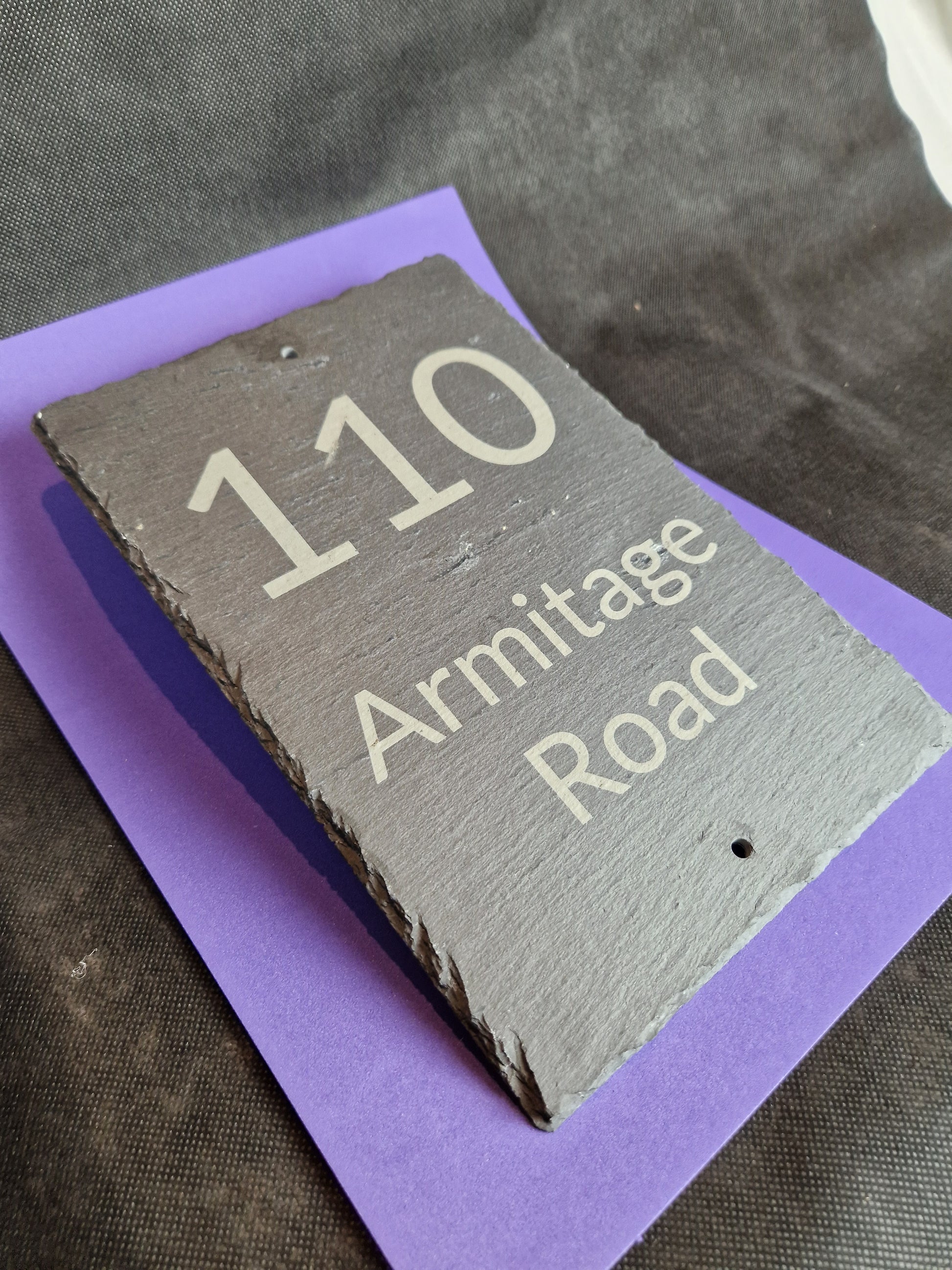 Black slate A4 house sign with custom laser engraved family name and house number
