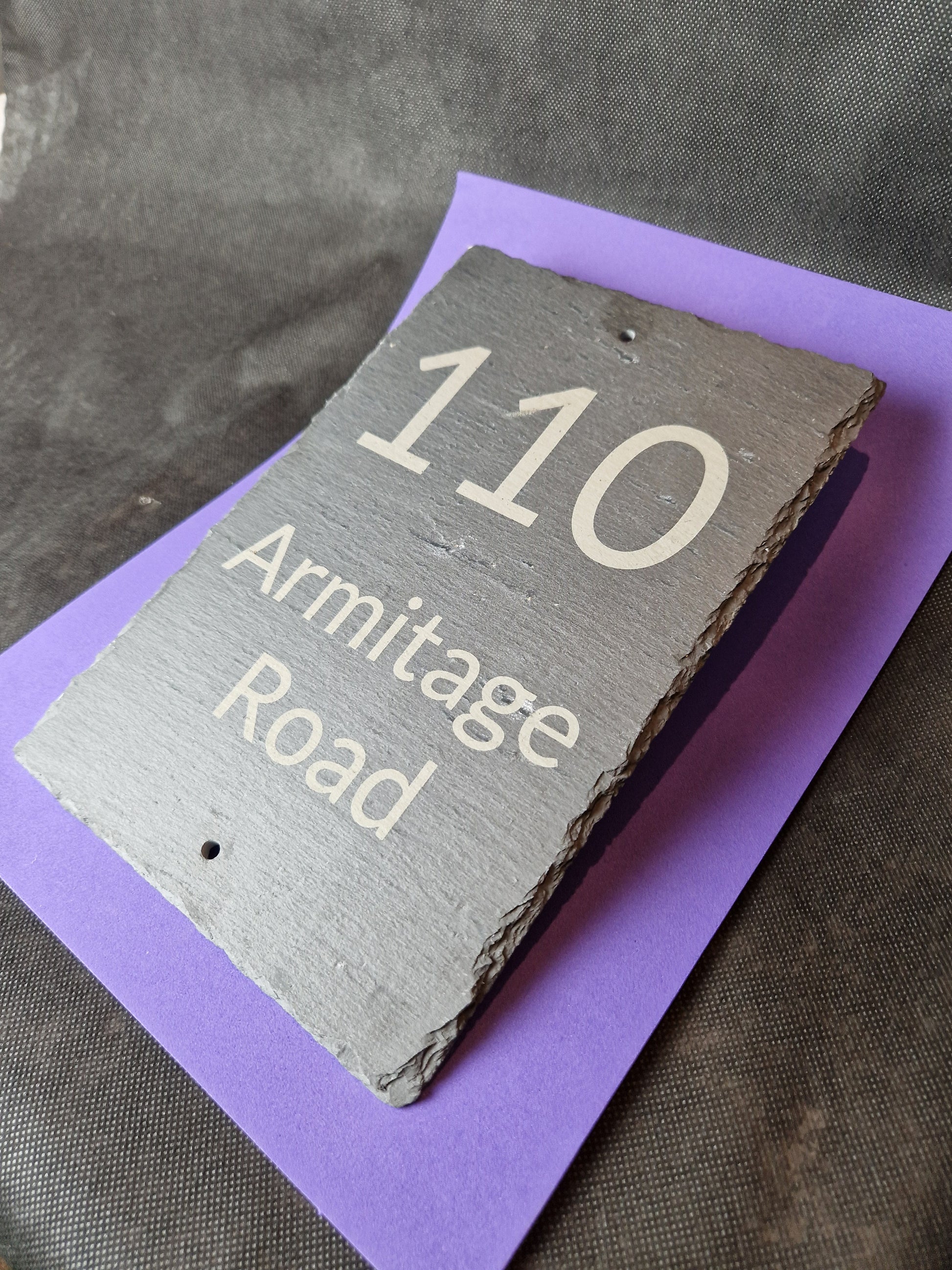 Black slate A4 house sign with custom laser engraved family name and house number