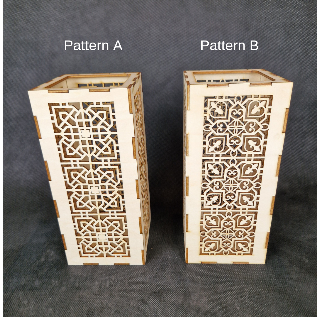 Decorative wooden lantern with intricate laser cut patterns and tea light holder