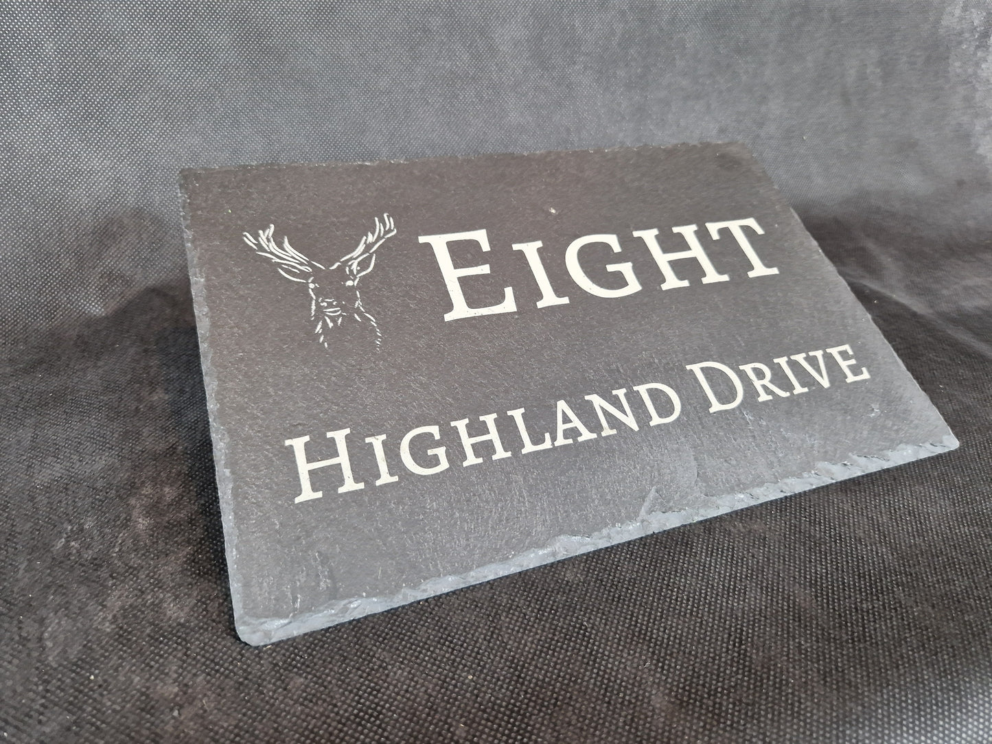 Black slate A4 house sign with custom laser engraved family name and house number