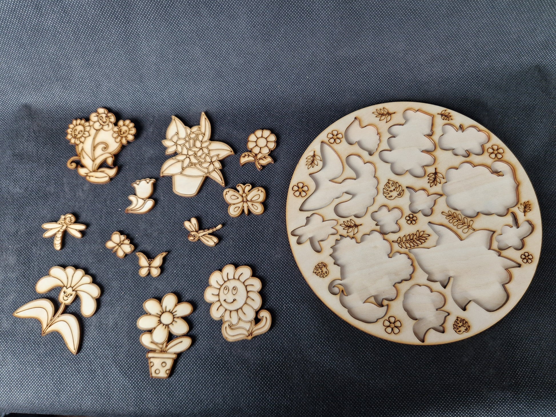 Wooden children's shape sorter puzzle laser cut and scored cartoon plant and butterfly design