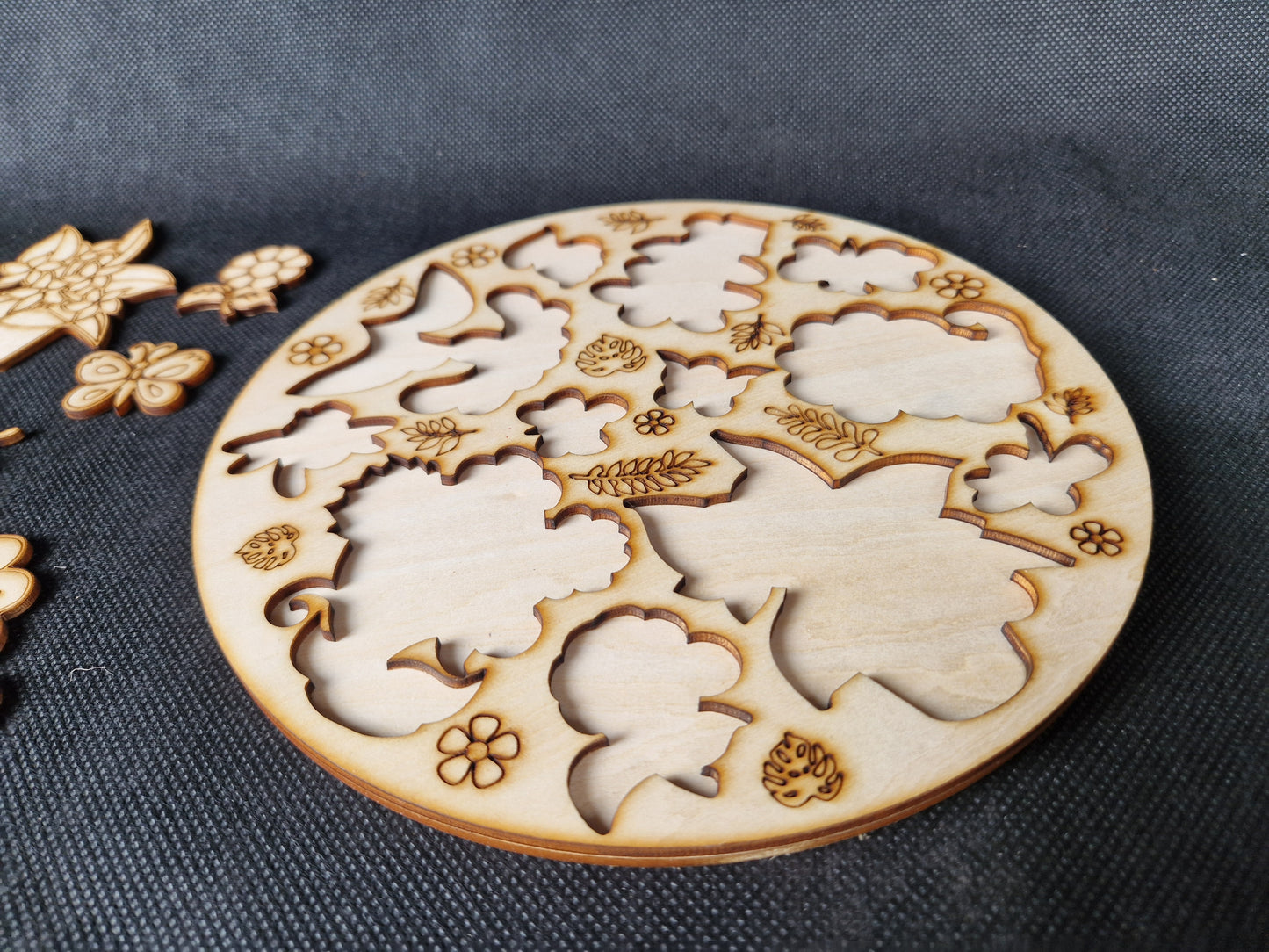 Wooden children's shape sorter puzzle laser cut and scored cartoon plant and butterfly design