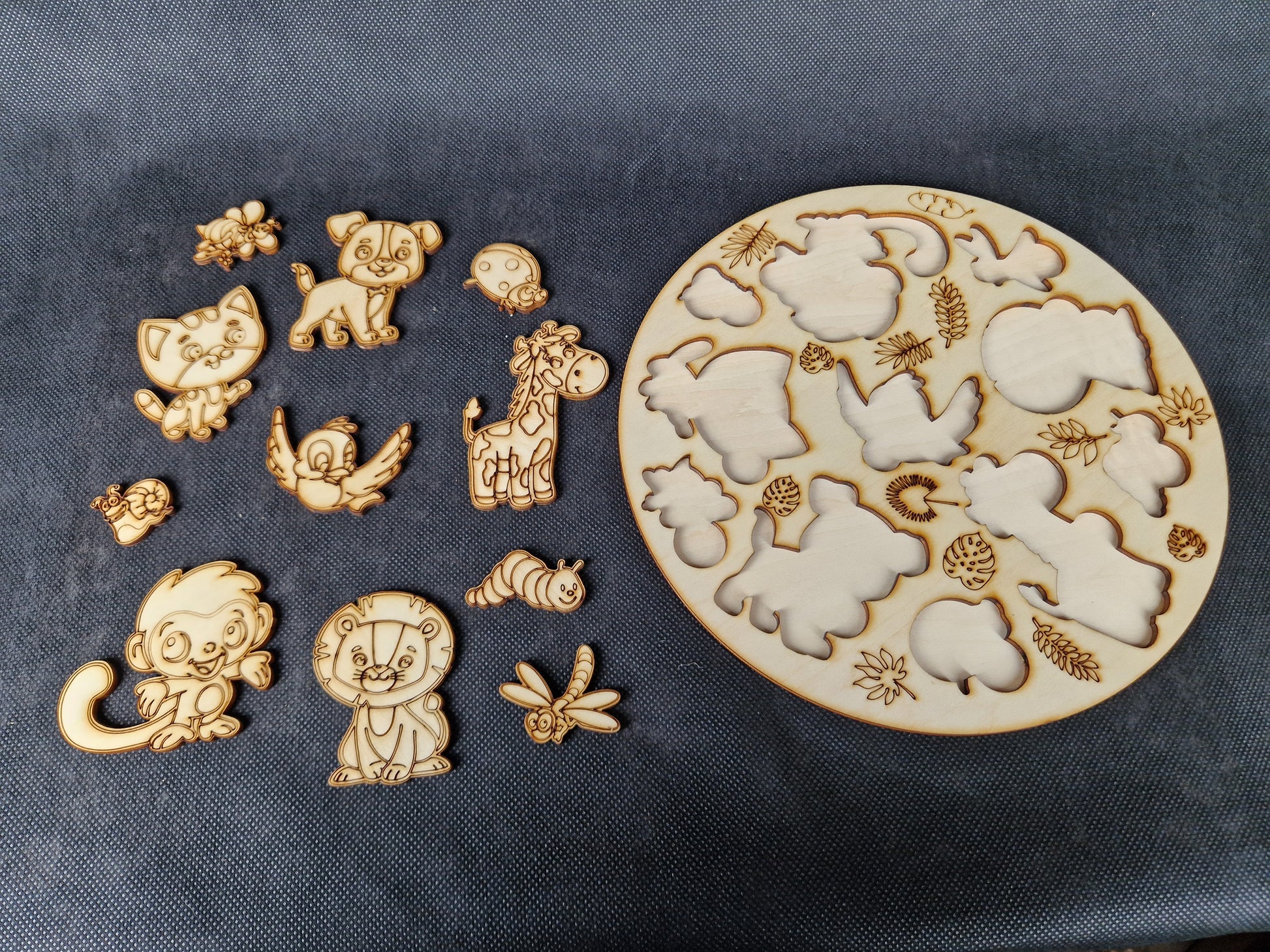 Wooden children's shape sorter puzzle laser cut and scored cartoon animal design