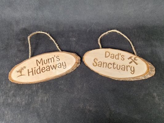 Natural wood slice hanging sign with rustic laser engraved text and jute rope hanger
