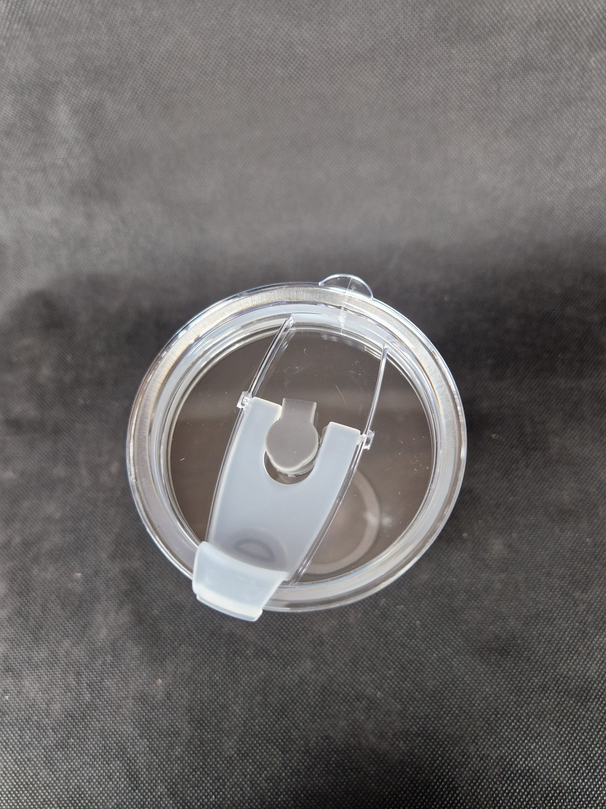 Stainless steel travel tumbler with custom laser engraved design and insulated walls