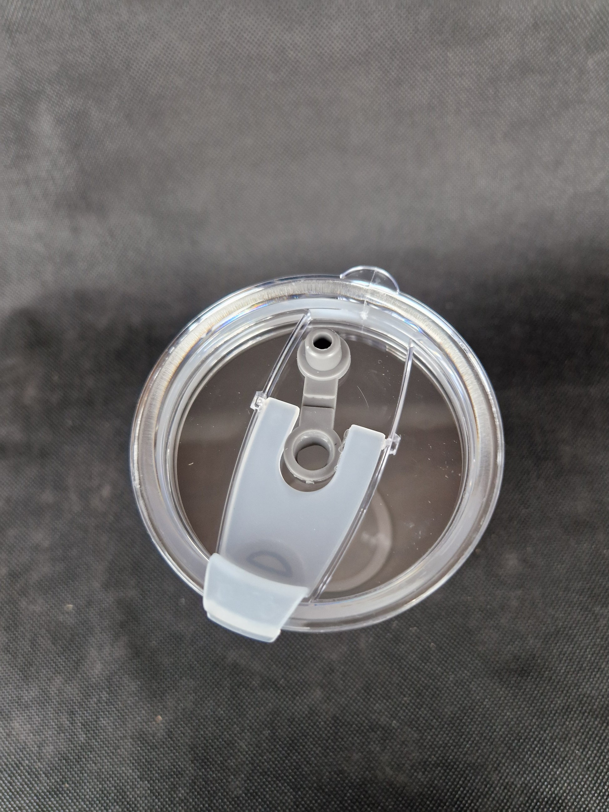 Stainless steel travel tumbler with custom laser engraved design and insulated walls