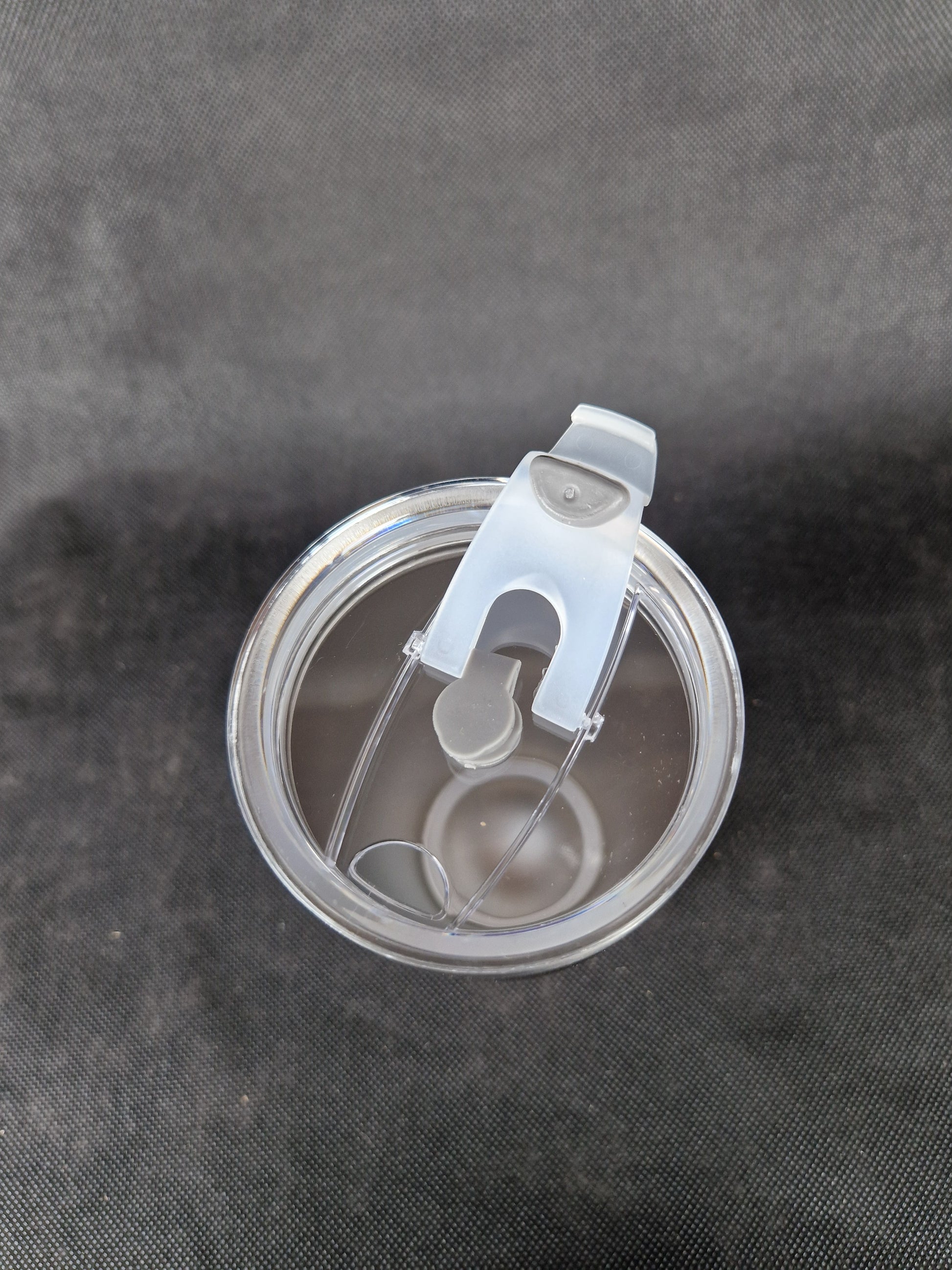 Stainless steel travel tumbler with custom laser engraved design and insulated walls