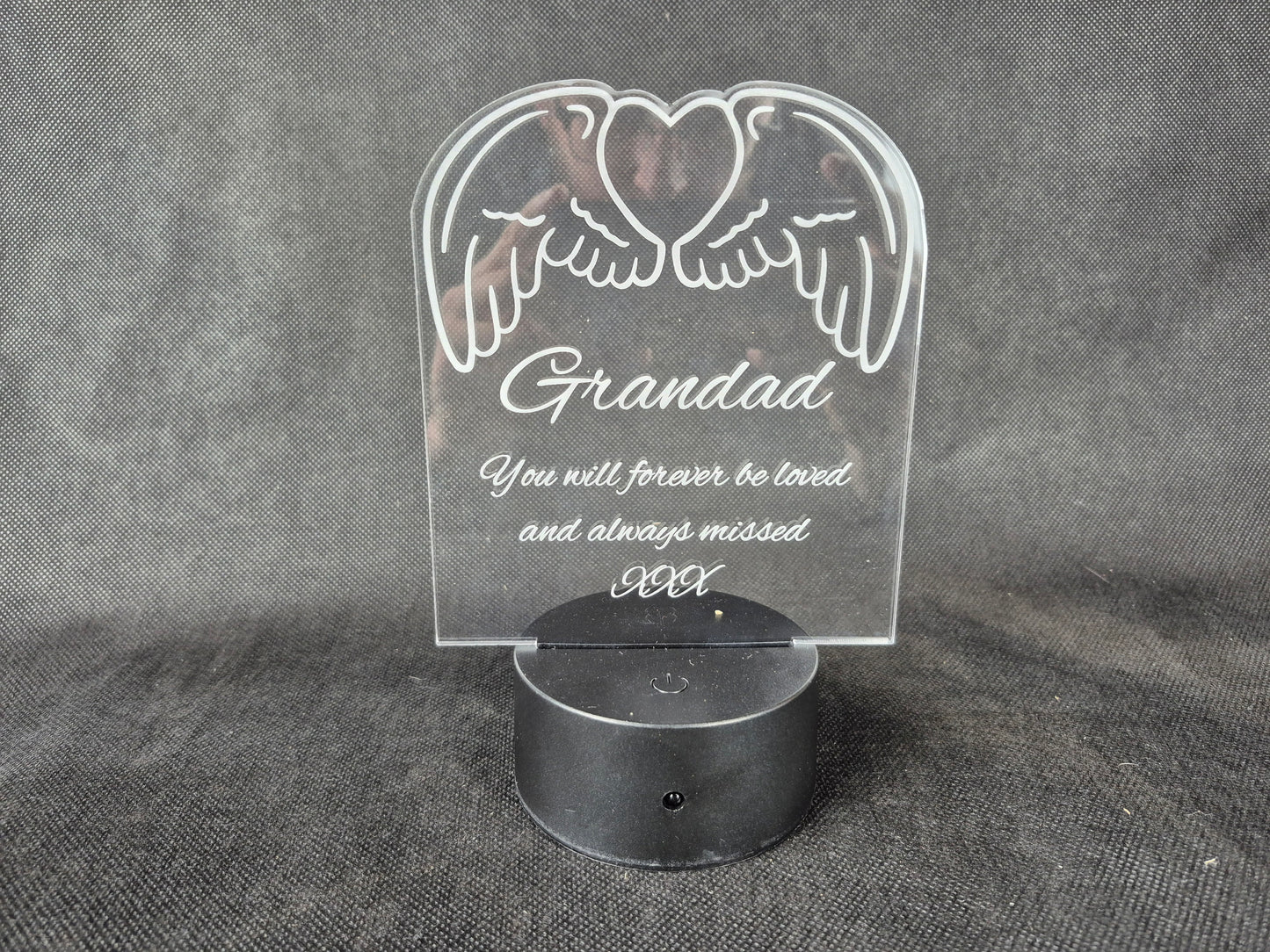 LED illuminated acrylic sign with custom laser engraved text and color-changing base