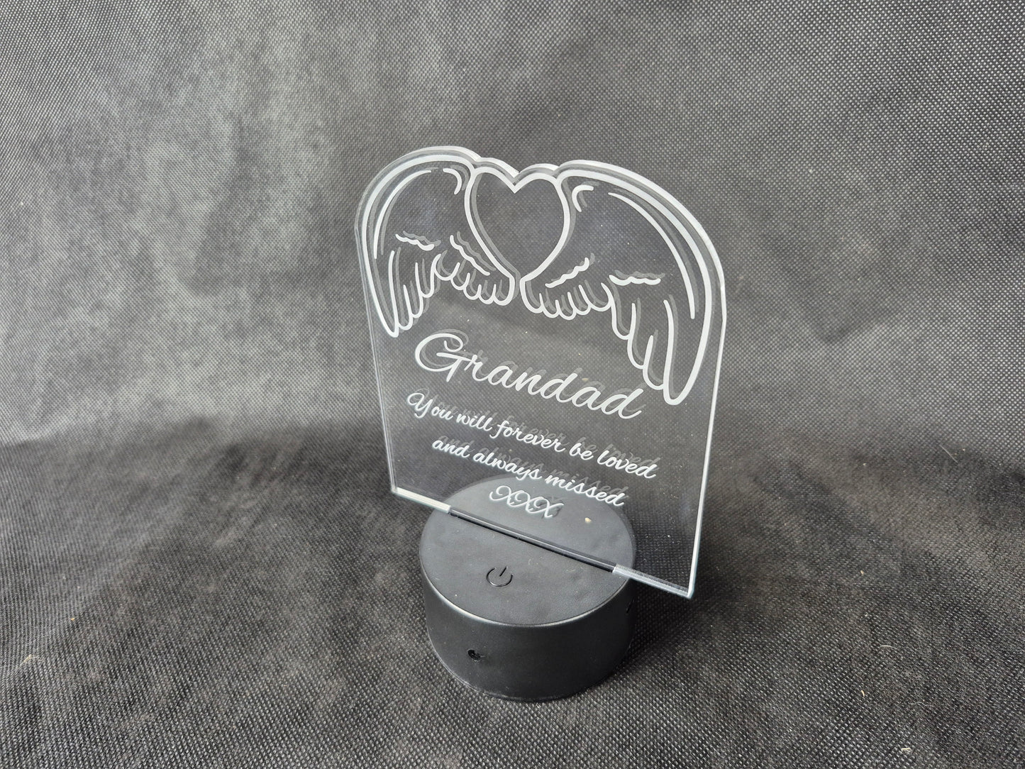 LED illuminated acrylic sign with custom laser engraved text and color-changing base