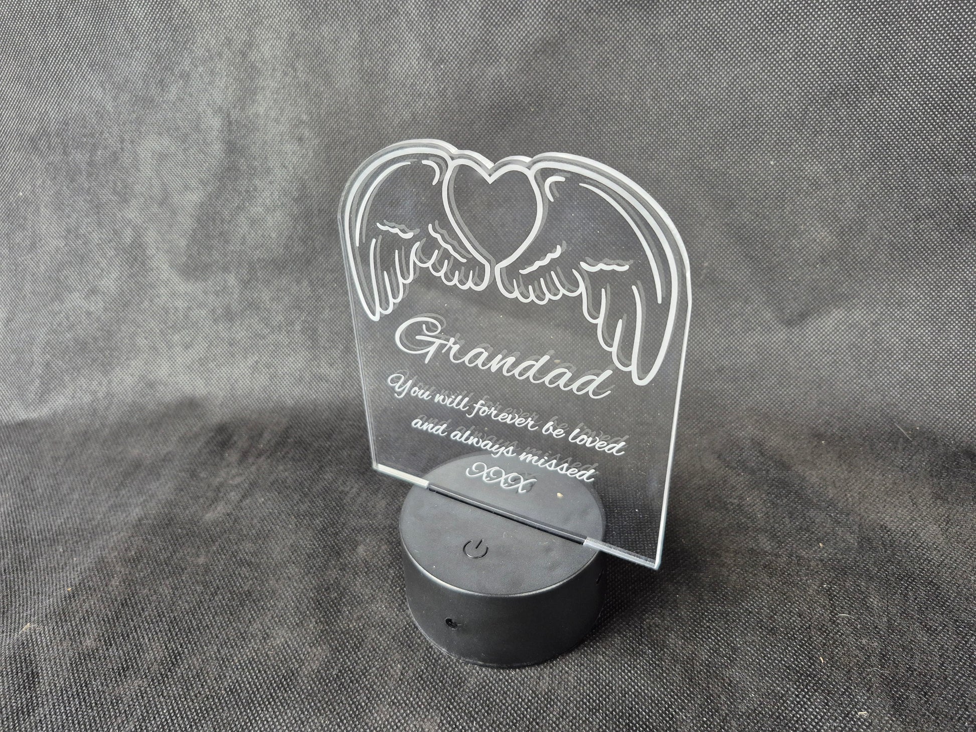 LED illuminated acrylic sign with custom laser engraved text and color-changing base