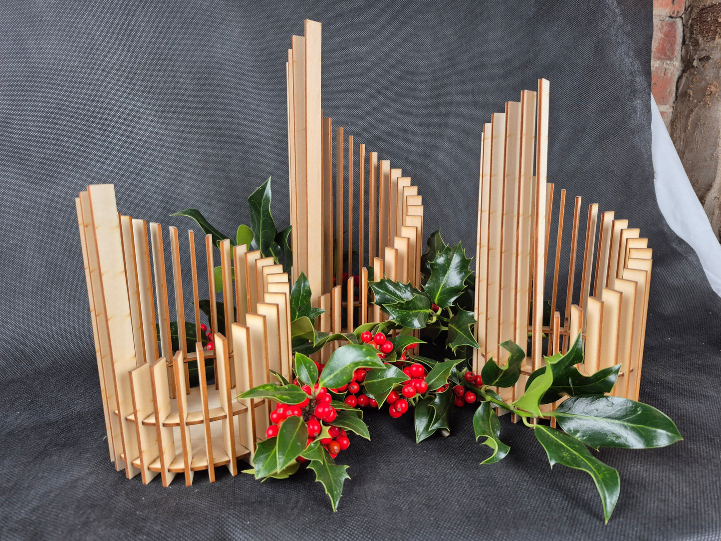 Stepped geometric candle holder set with modern design and ambient lighting