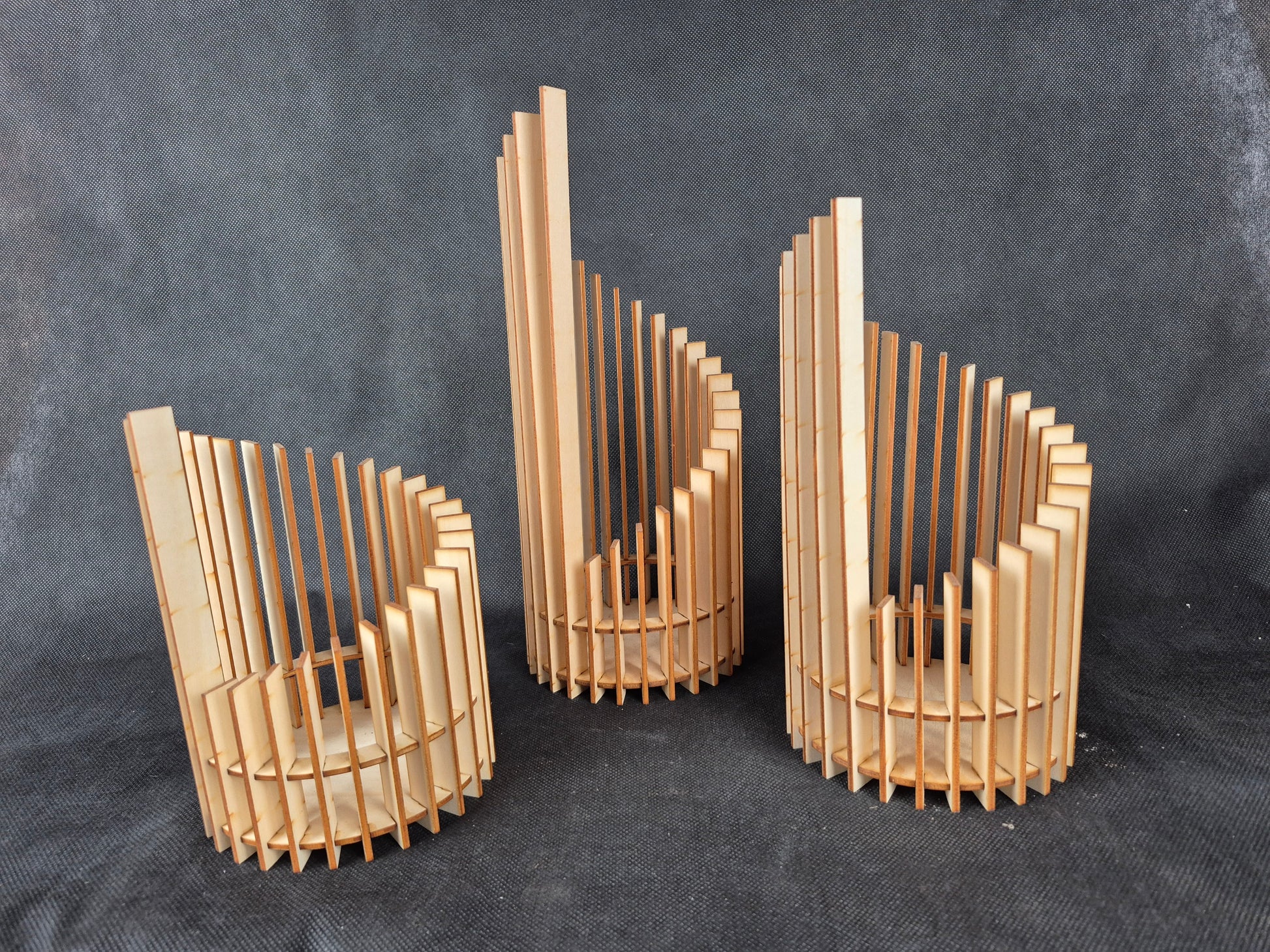 Stepped geometric candle holder set with modern design and ambient lighting