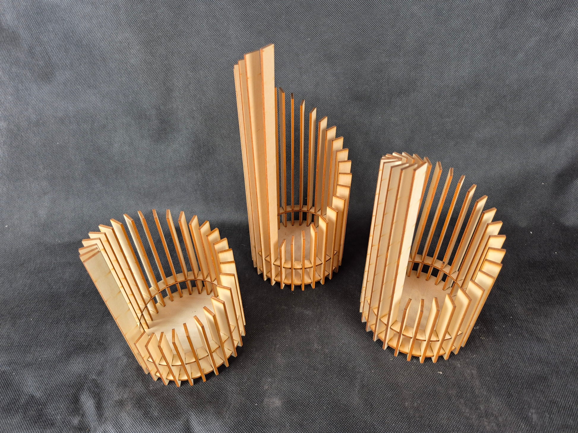 Stepped geometric candle holder set with modern design and ambient lighting