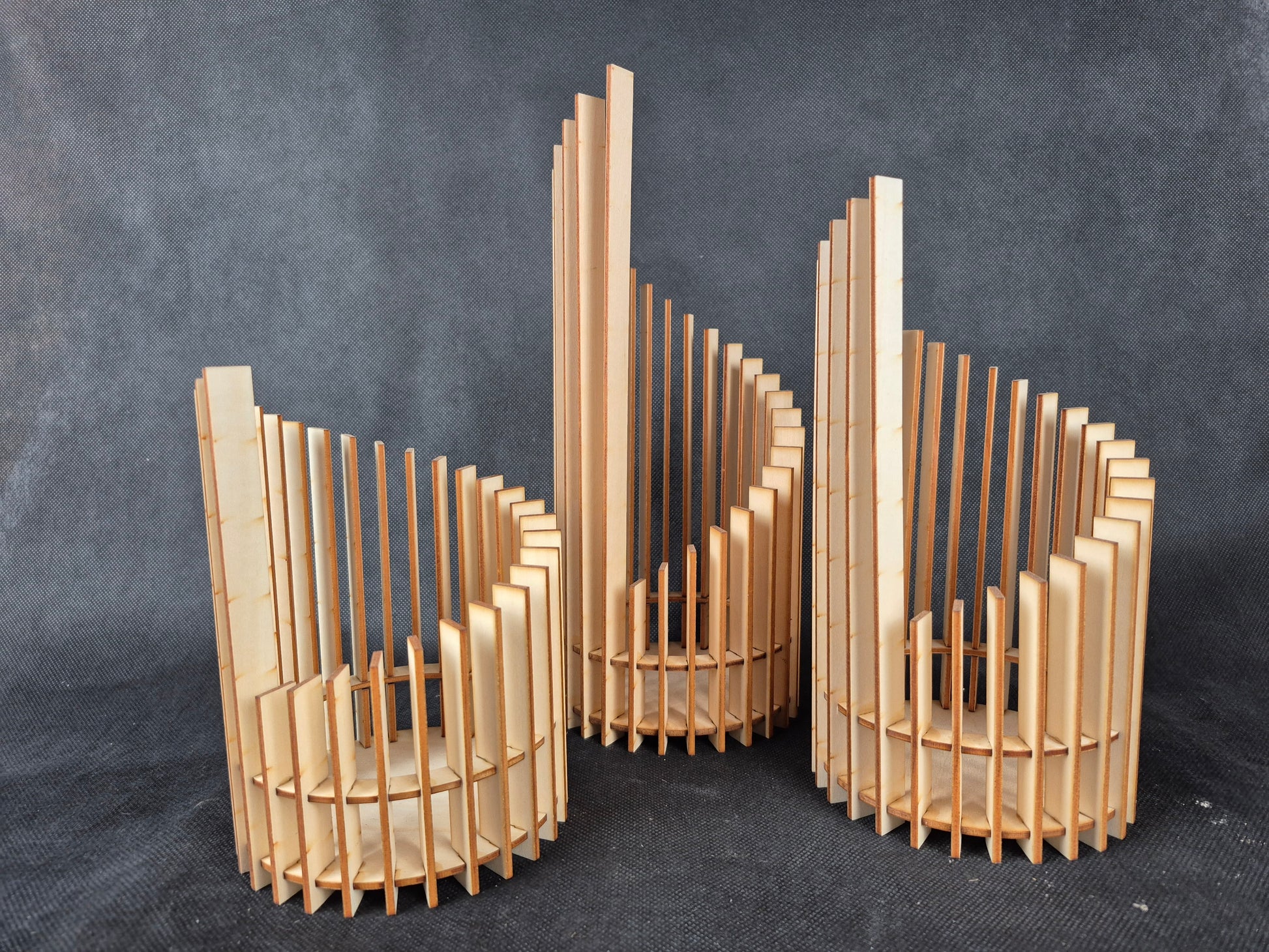 Stepped geometric candle holder set with modern design and ambient lighting