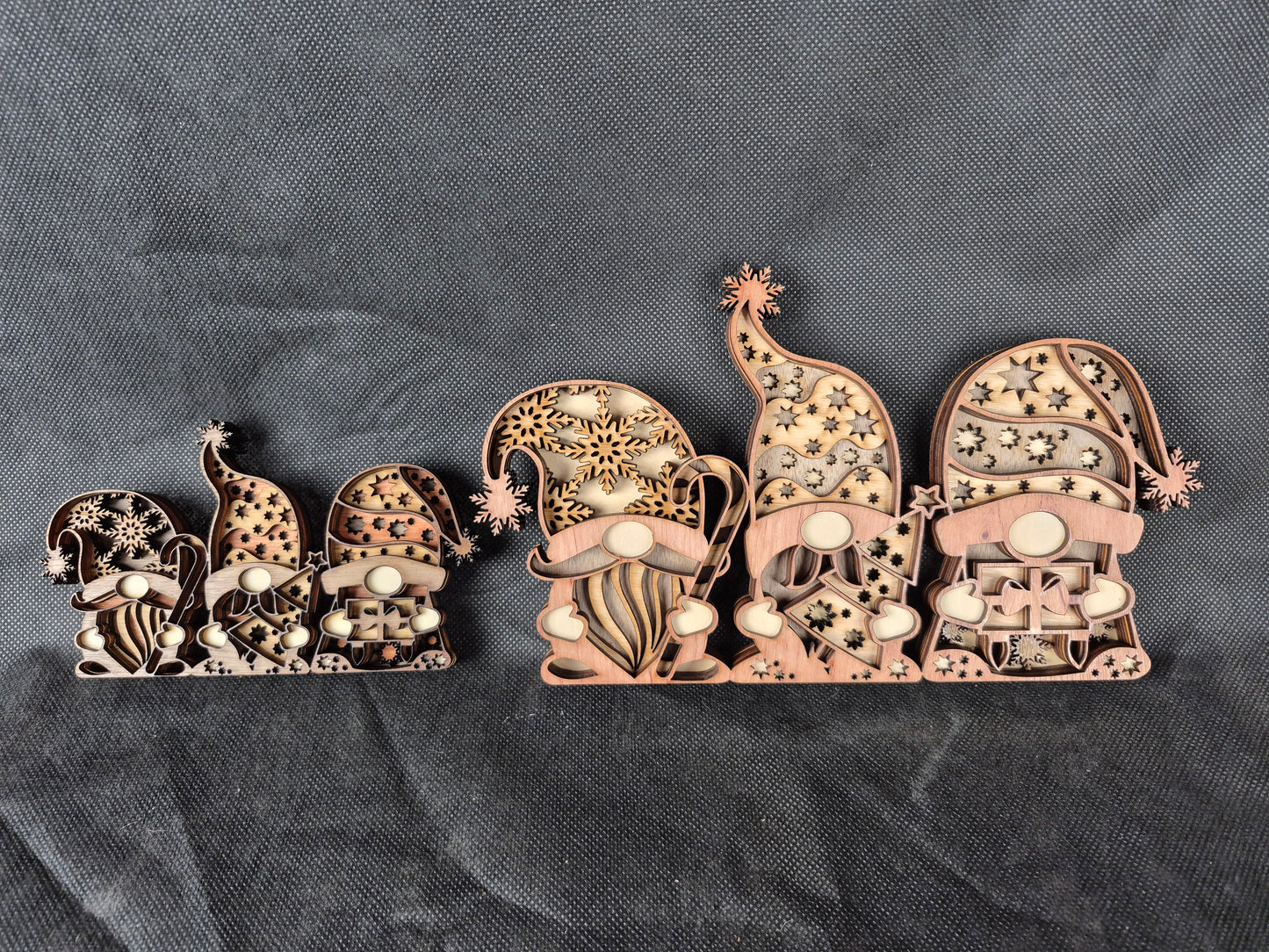 Three-dimensional wooden Nordic Gonk decoration with layered laser cut design and festive details