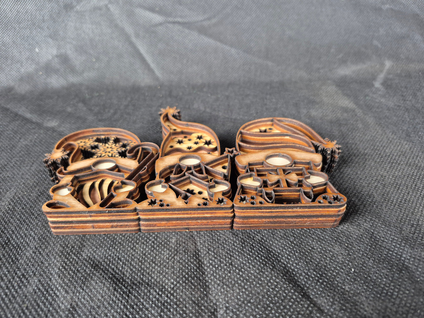 Three-dimensional wooden Nordic Gnome with layered laser cut design and festive details