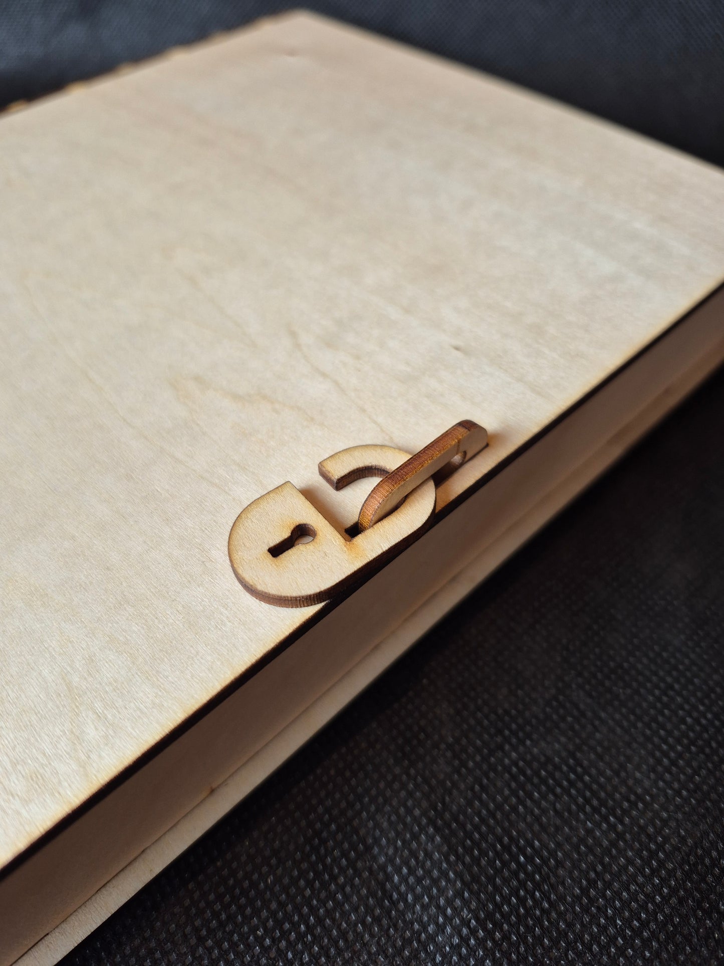 Personalised wooden memorial keepsake box with custom laser engraving on the lid.