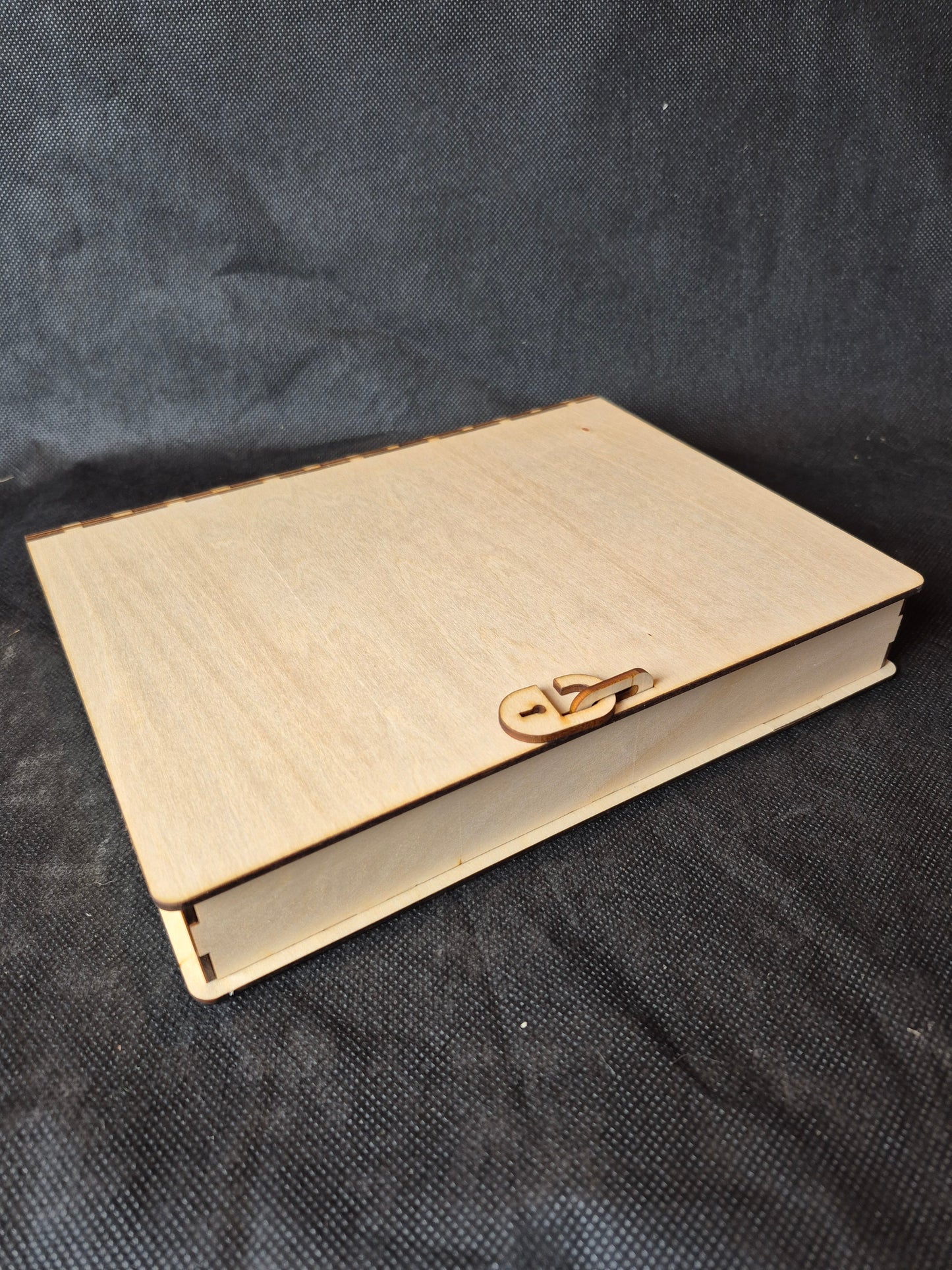 Personalised wooden memorial keepsake box with custom laser engraving on the lid.