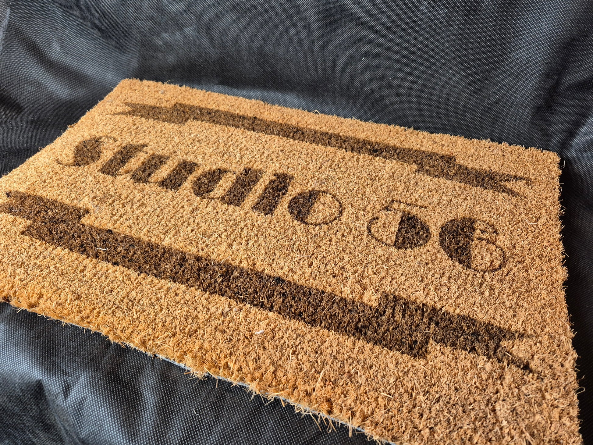 Natural coir door mat with personalized laser design and durable non-slip backing