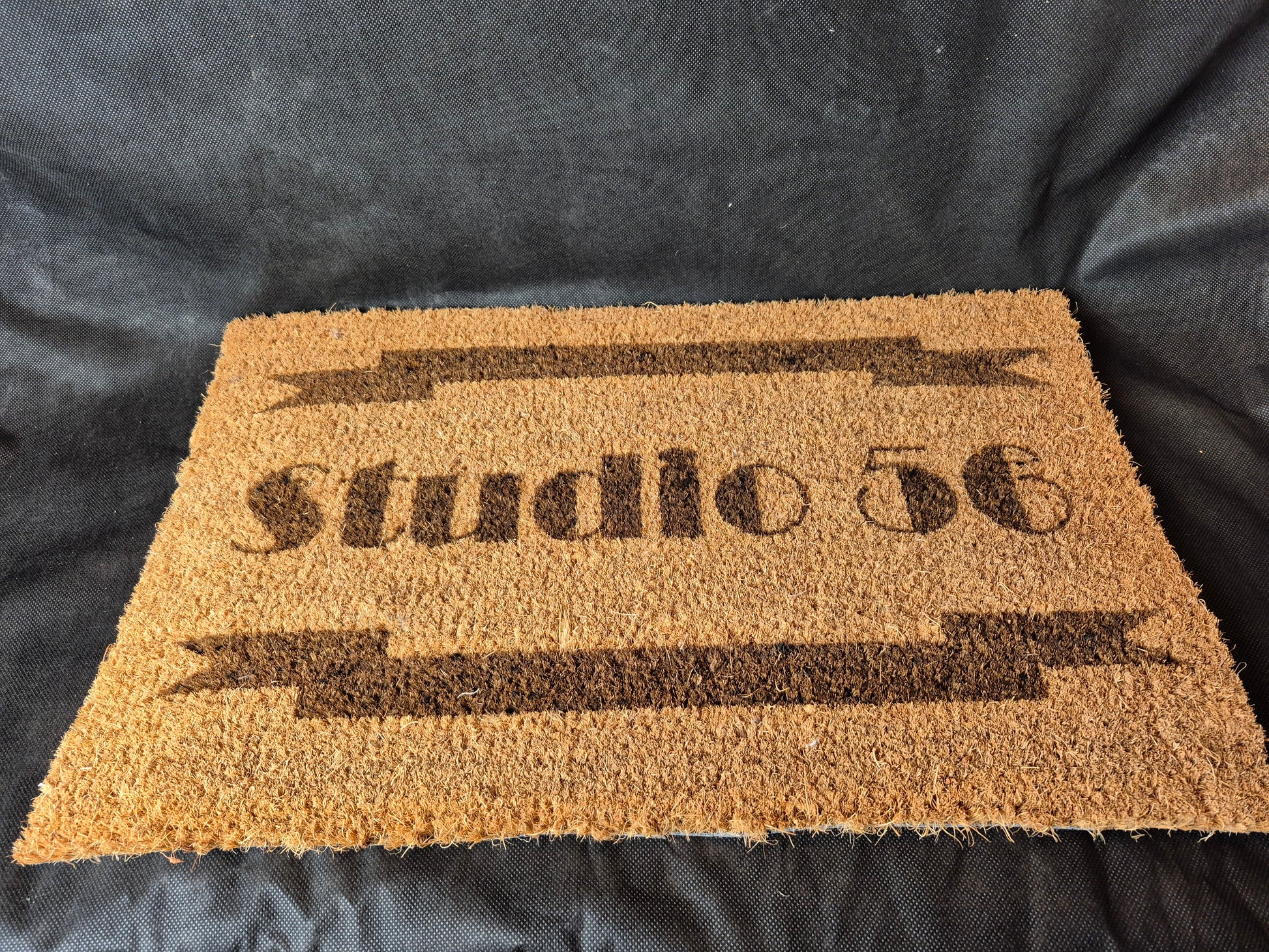 Natural coir door mat with personalized laser design and durable non-slip backing